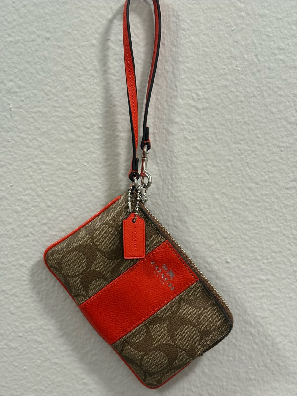 Coach Signature Canvas Wristlet with Orange Trim